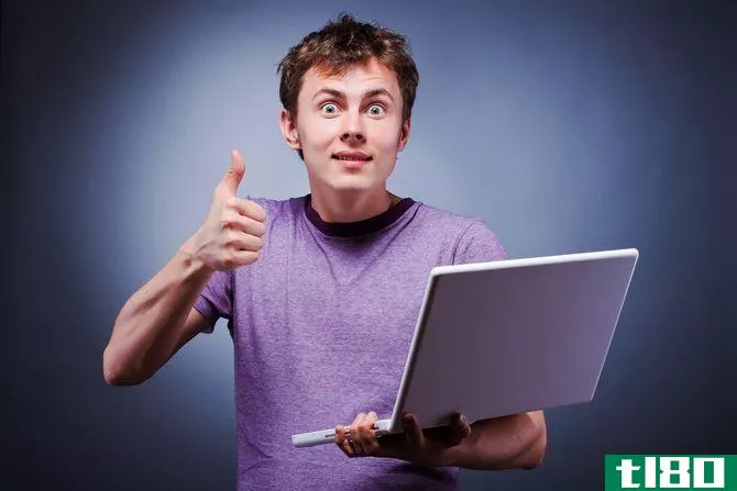 Guy Thumbs Up on Laptop