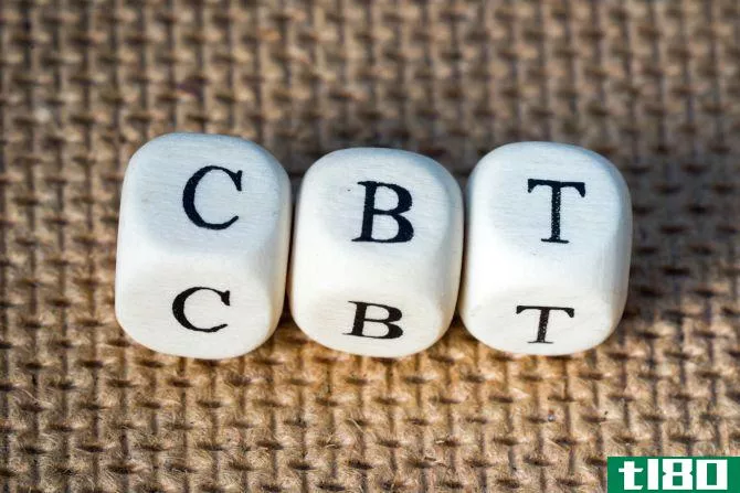 CBT spelt out on lettered dice