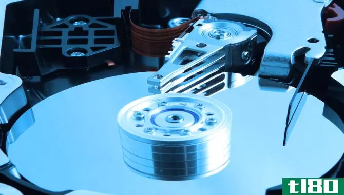 This image depicts the bare internal glass platter of a hard disk drive