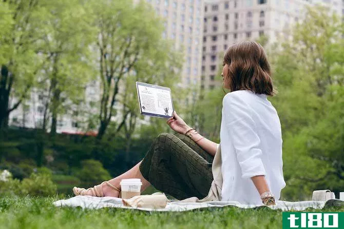Woman Reading on a Samsung Tablet
