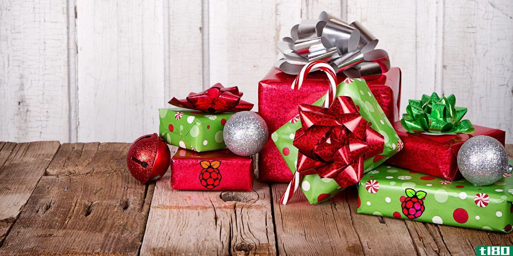christmas-presents-and-ornaments-on-wooden-background