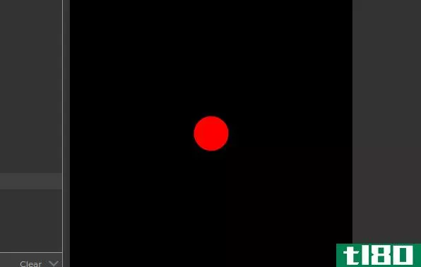 A red circle on a black background canvas in p5.js