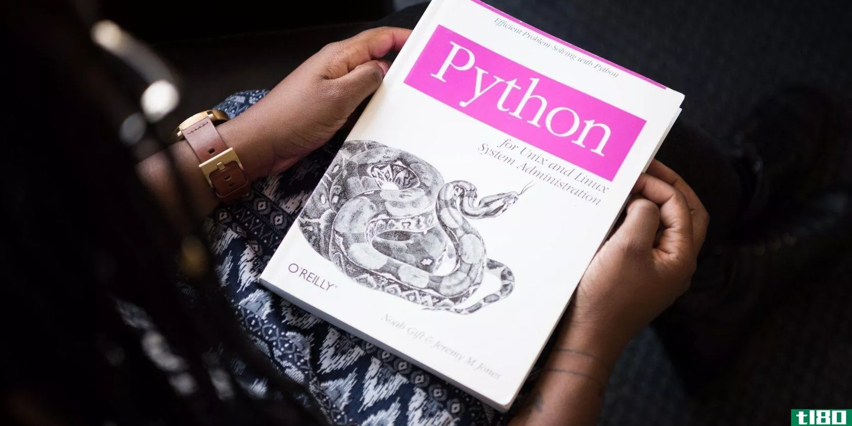 Holding a Python guide book