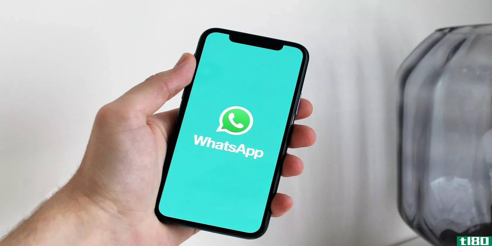 Phone screen showing WhatsApp