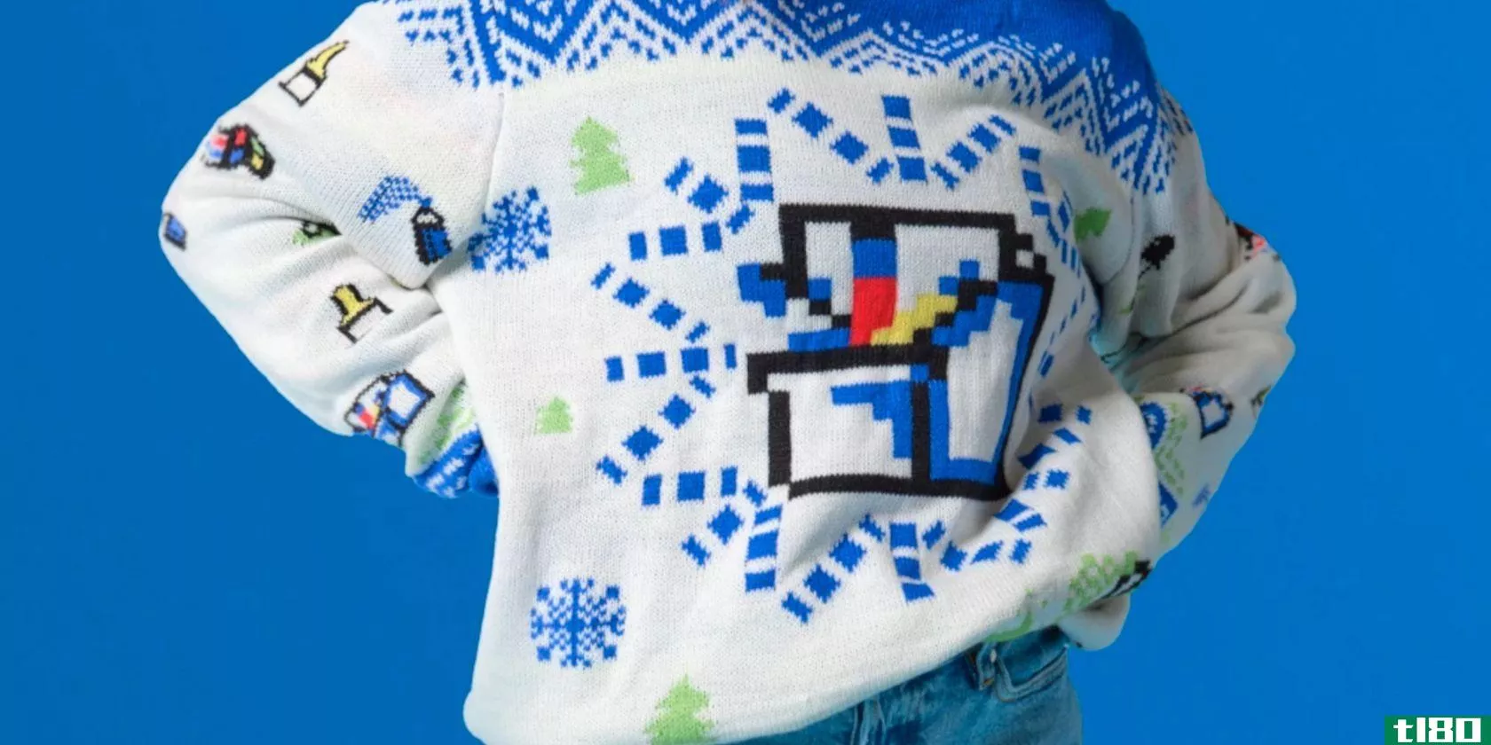A lady wearing a Windows Ugly Sweater