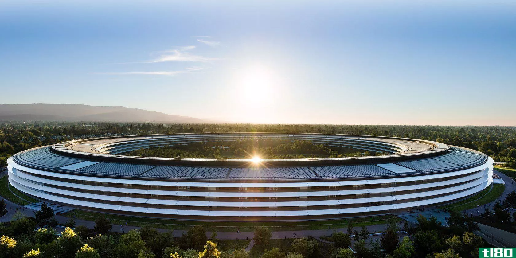 A still photograph captured by a drone showing an aerial view of the Apple Park headquarters in Cupertino, California
