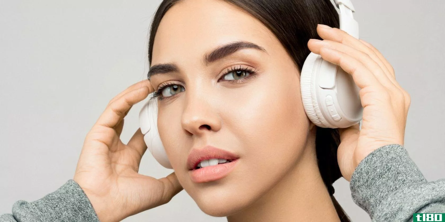 Woman Wearing White Headphones
