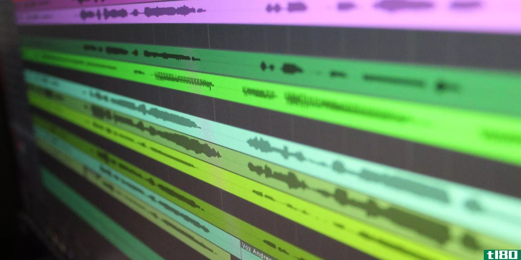 A digital audio workstation featuring multiple tracks in green and pink