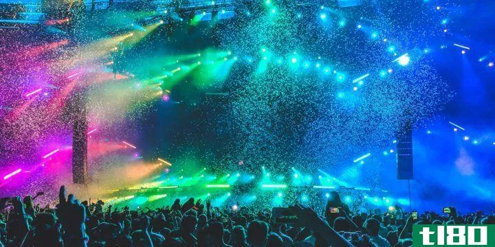 a concert with a very colorful lightshow