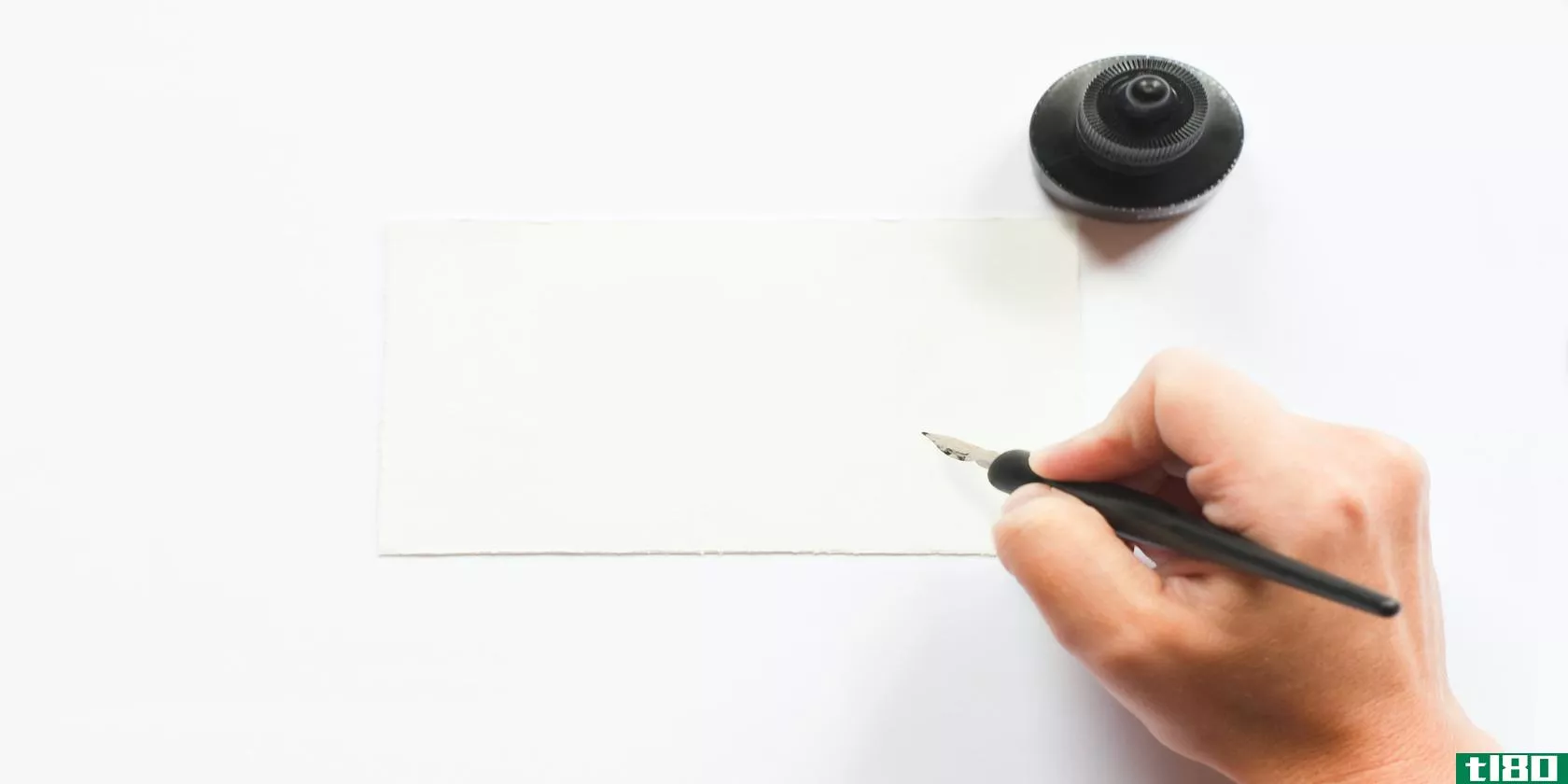 Person writing on blank page