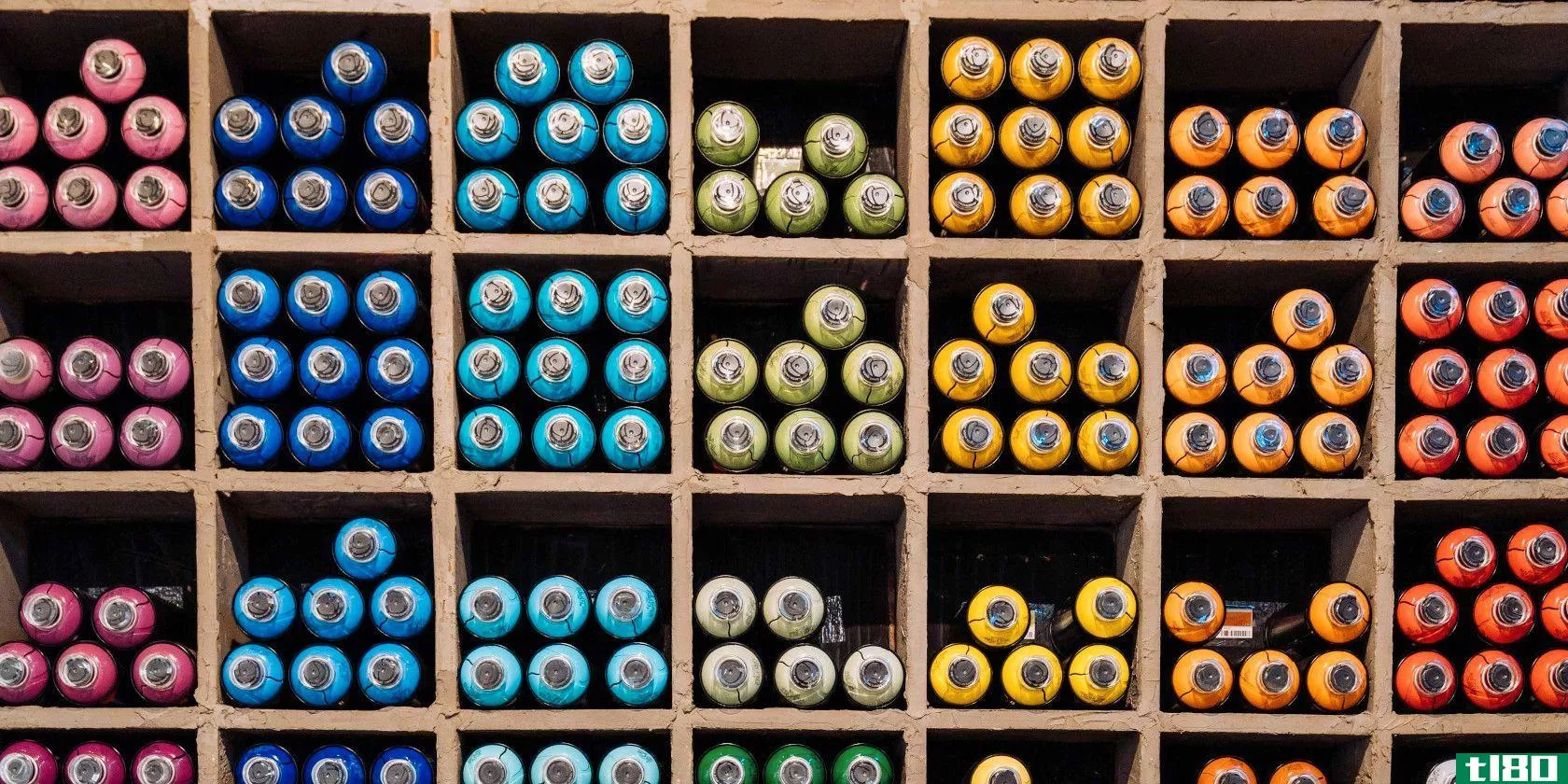 rolls of fabric organized by color