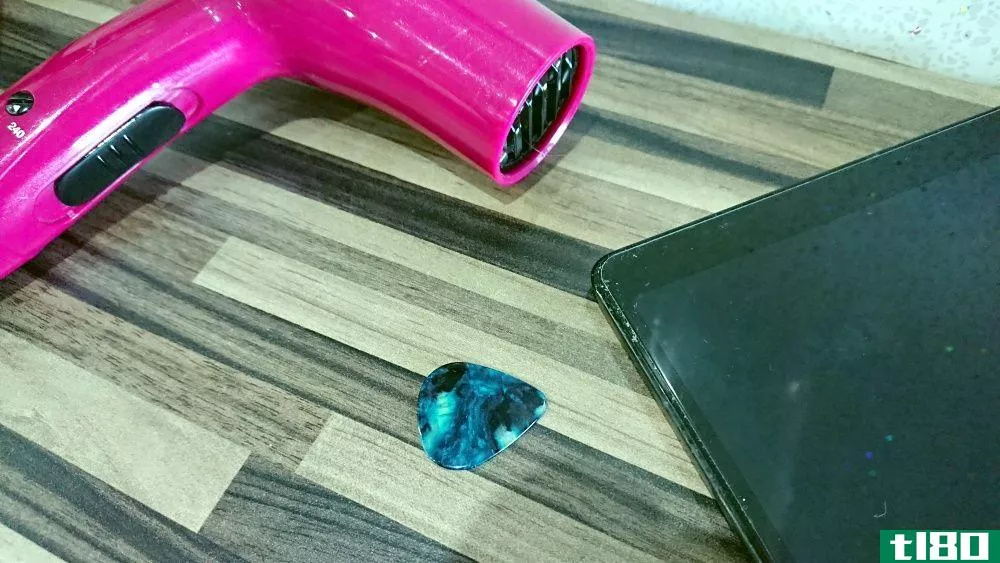 Use a hairdryer to soften the screen protector adhesive