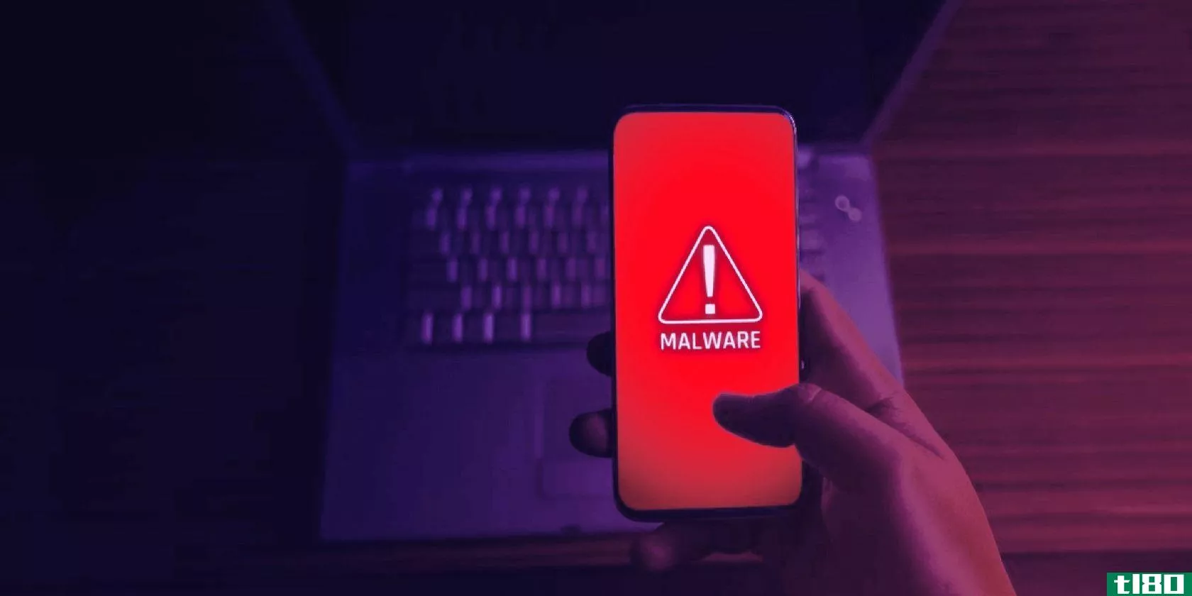 Phone in hand displaying warning