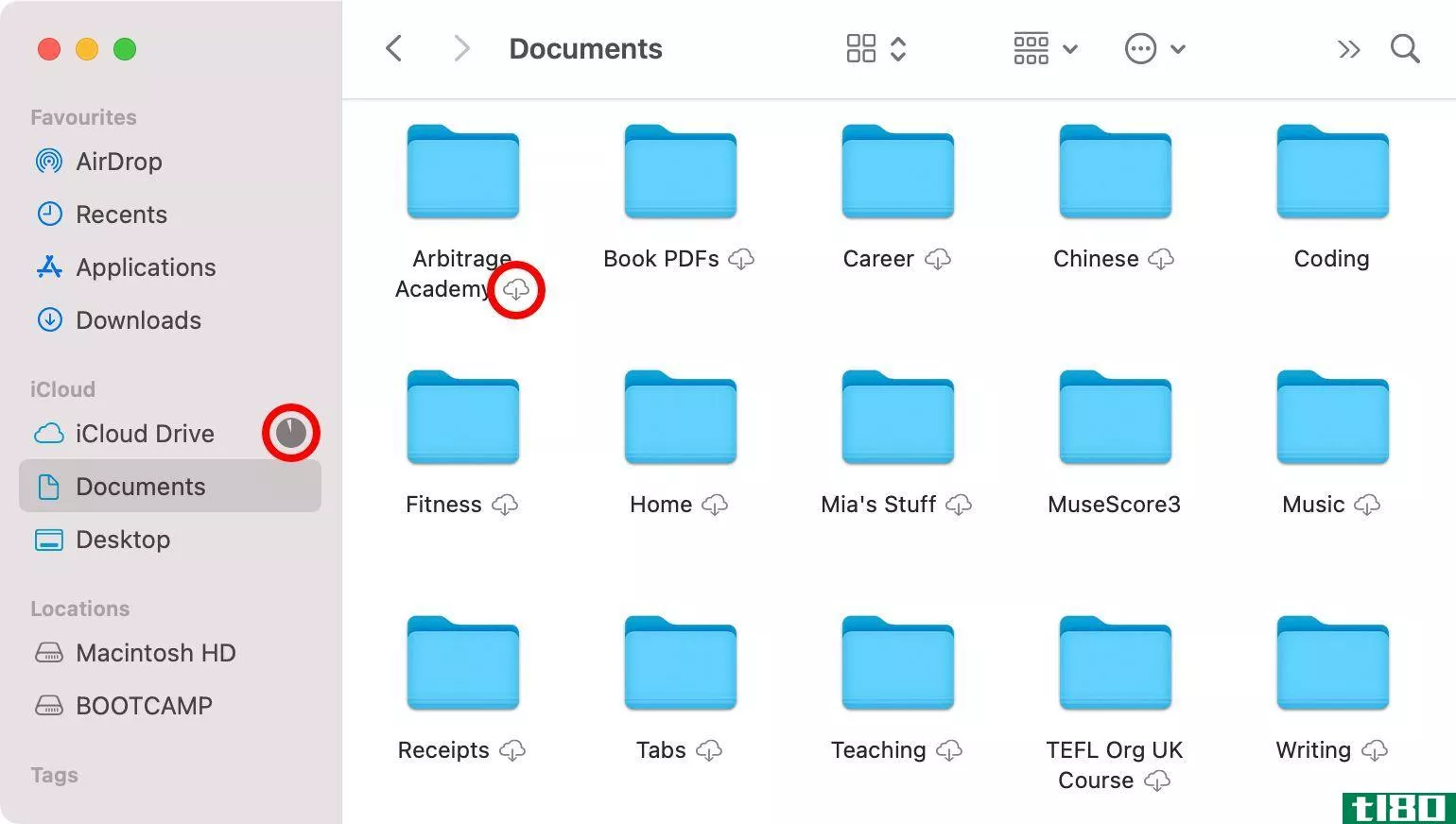 iCloud Drive download icon and loading circle in Finder