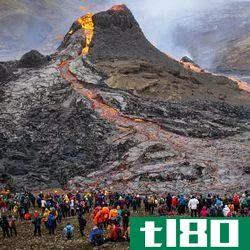 Hikers admire the erupting Fagradalsfjall volcano.