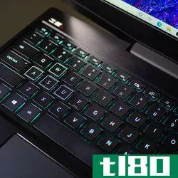 <em>The backlit keyboard gets the job done, but you’ll probably be better served with your own keyboard and mouse.</em>
