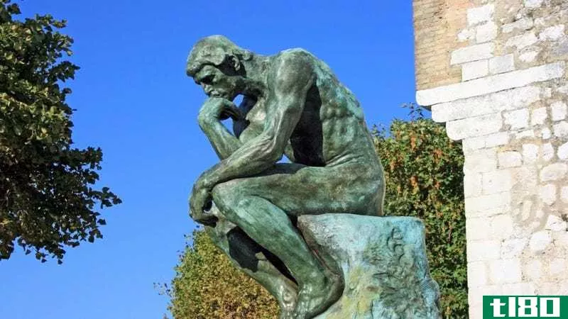 A photo of the "Thinking Man" statue