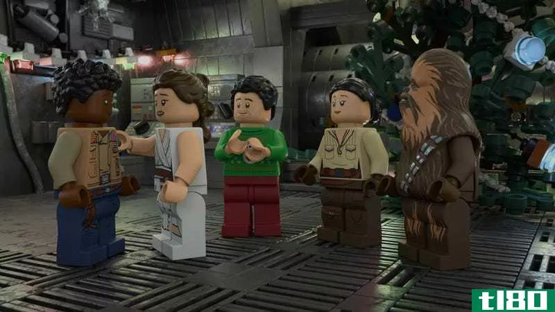 A screenshot from the LEGO Star Wars Holiday Special showing Finn, Rey, and Chewbacca