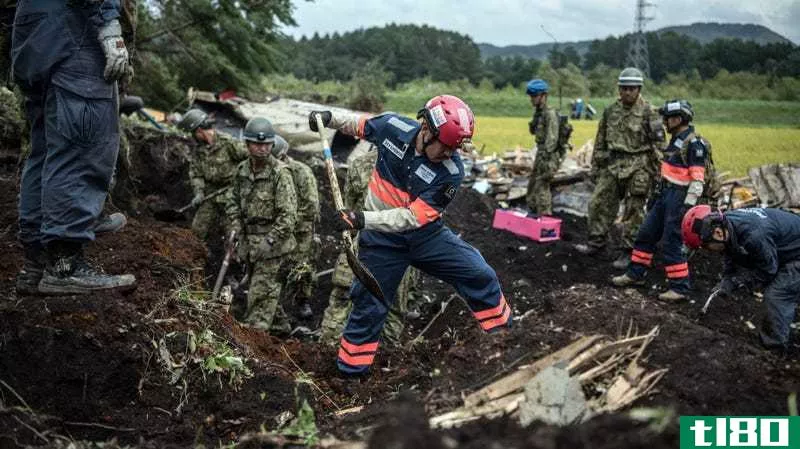 Rescuers search through debris in the recent Hokkaido earthquake.