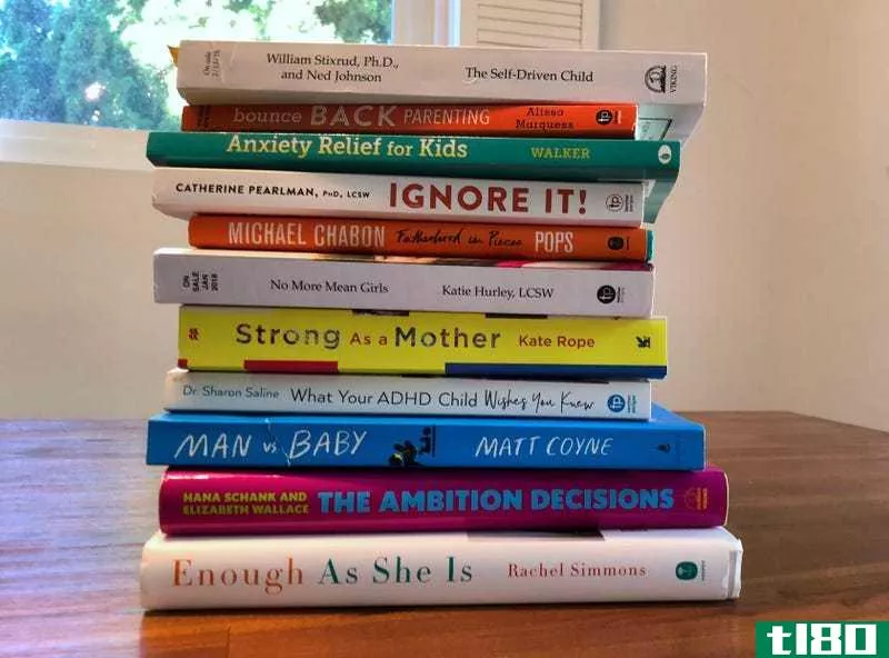 A stack of parenting books