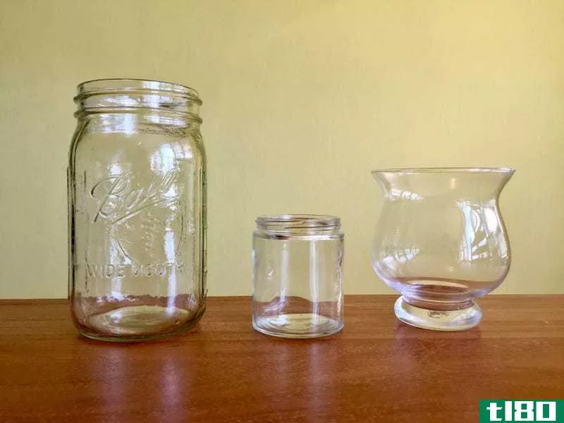 A few household containers that would make for great terrariums. From left, a classic Ball jar, a **all jam jar and an inexpensive candle holder. Photo by Olga Ok**an/tl80.