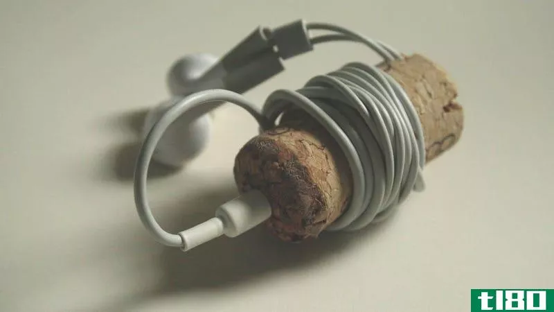 Illustration for article titled Turn a Wine Cork Into a Wrap-Around Earbud Holder