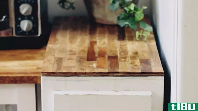 Illustration for article titled Build a Cheap, DIY “Butcher Block” Countertop With Plywood and Paint Sticks