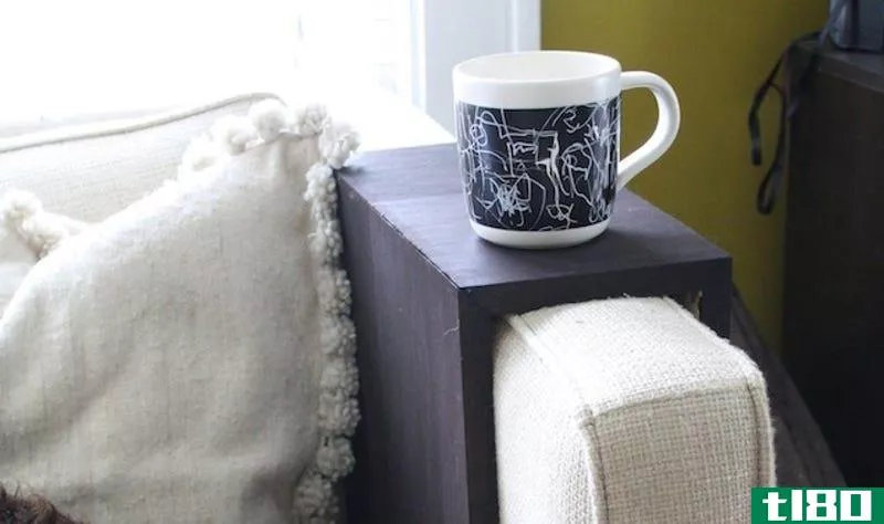 Illustration for article titled DIY Wooden Couch Sleeves Make the Perfect Spot for Your Drink