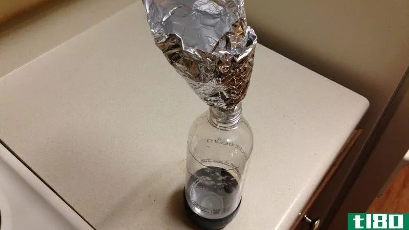Illustration for article titled Create a Makeshift Funnel with Aluminum Foil
