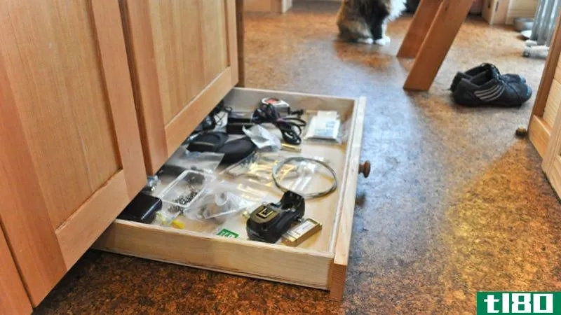 Illustration for article titled Replace Your Cabinet Kickplate with Tiny Drawers to Increase Storage Space