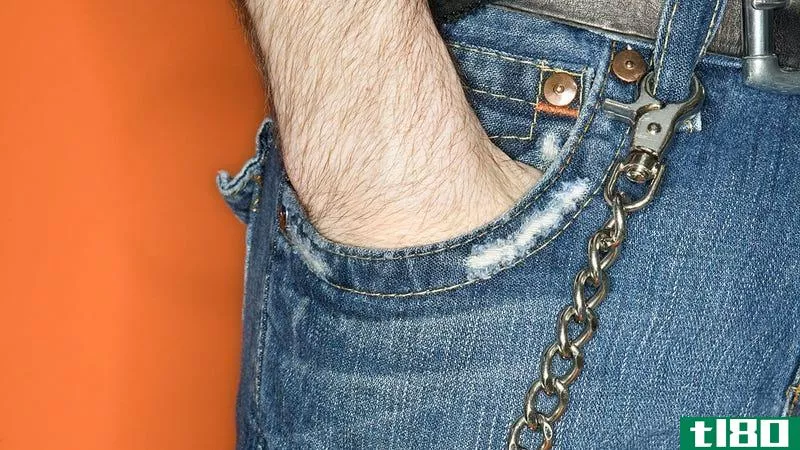 使用维可牢尼龙搭扣，防止钱包在活动时从口袋里掉出来