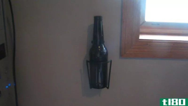Illustration for article titled Mount a Cycling Water Bottle Cage to Your Wall to Keep Drinks Handy and Avoid Spills