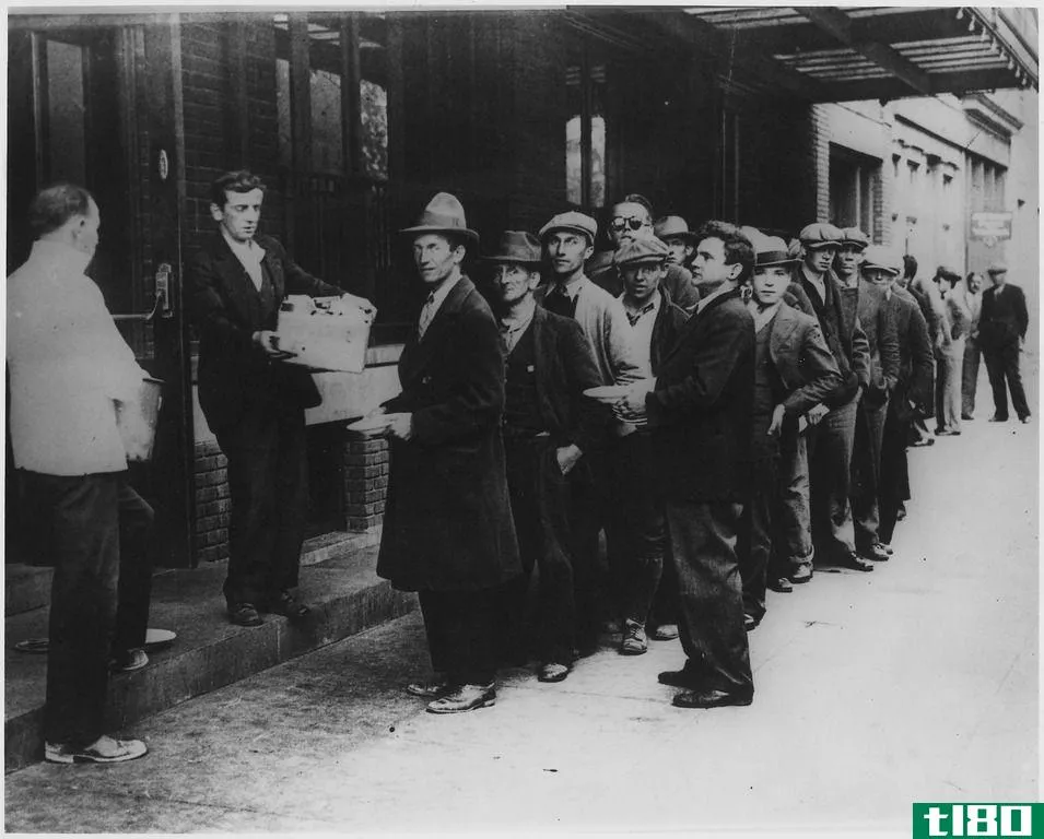Long line of people waiting to be fed in breadlines in New York City during the Great Depression