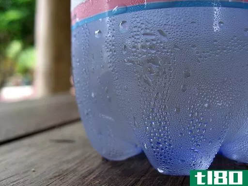 Condensation happens when the temperature of the air is lowered. This reduces the amount of water vapor that can exist in air, so the water molecules join together to form liquid droplets.